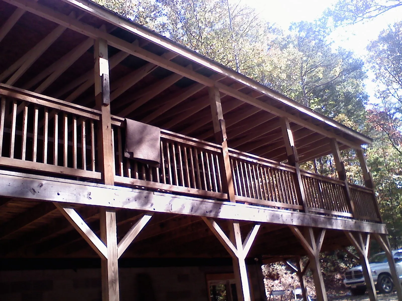 Timber framing under a new elevated porch and deck — Roof Leak Repair in Tobaccoville by Roofing Brothers